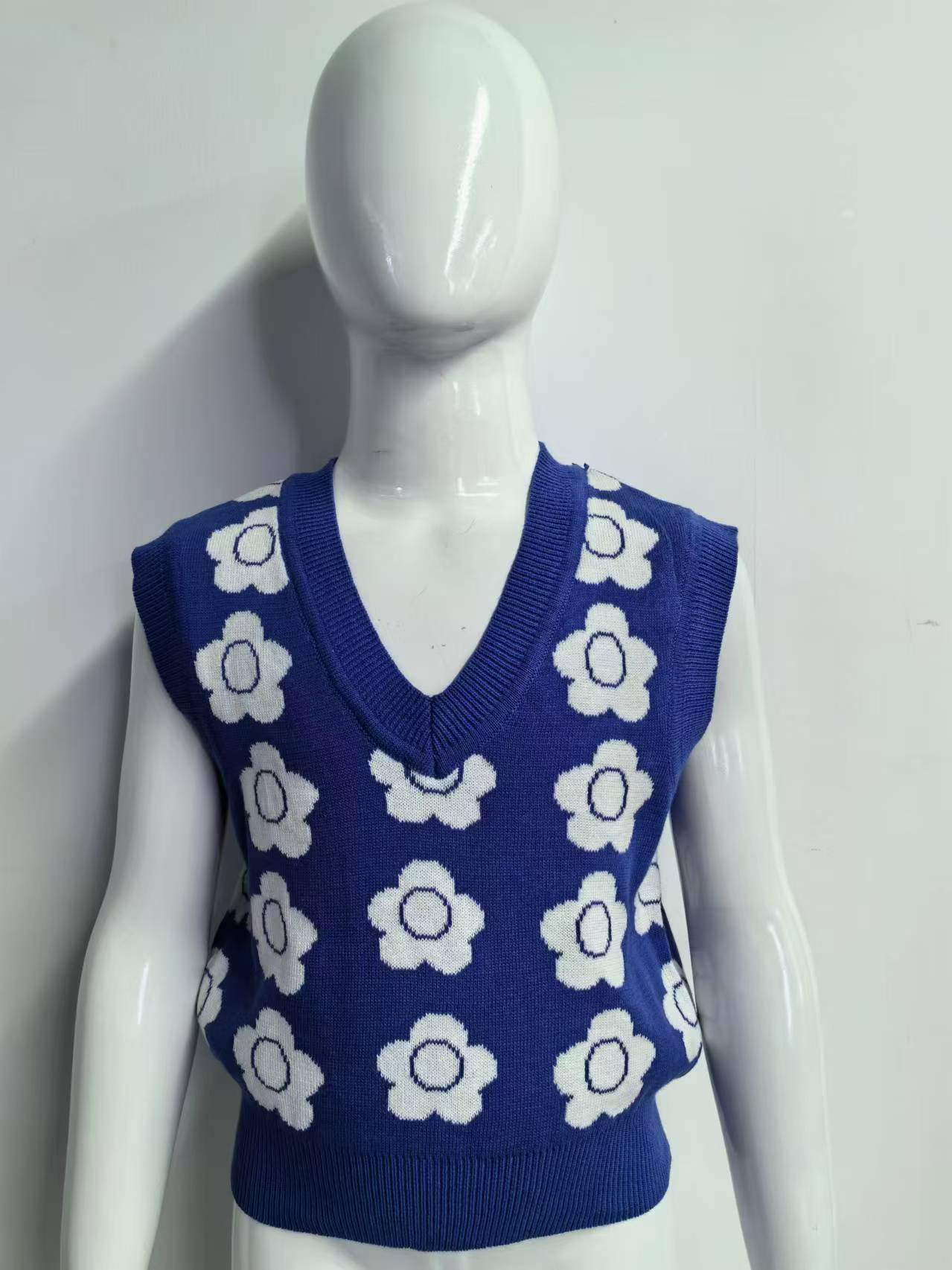 Knitted west for girls